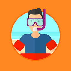 Image showing Man with snorkeling equipment on the beach.