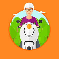 Image showing Woman riding scooter.