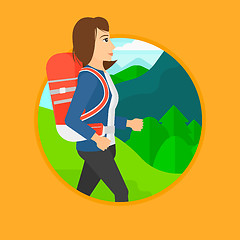 Image showing Woman with backpack hiking.