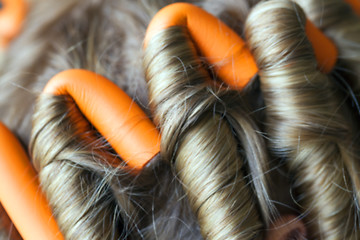 Image showing curlers in her hair