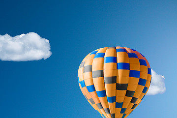 Image showing Hot air balloon against brilliant blue sky