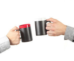 Image showing Businessman hand holding a cup of tea