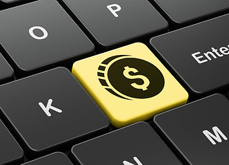 Image showing Money concept: Dollar Coin on computer keyboard background