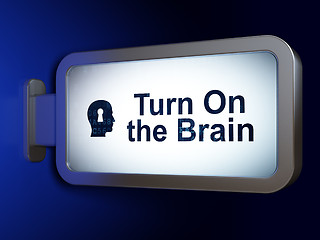 Image showing Learning concept: Turn On The Brain and Head With Keyhole on billboard background