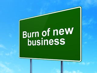 Image showing Finance concept: Burn Of new Business on road sign background
