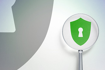 Image showing Protection concept:  Shield With Keyhole with optical glass on digital background