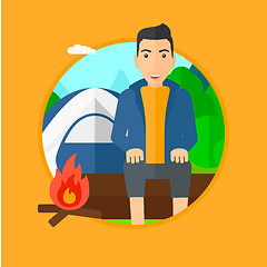 Image showing Man sitting on log in the camping.