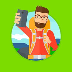 Image showing Man with backpack making selfie.