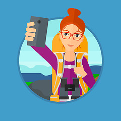 Image showing Woman with backpack making selfie.