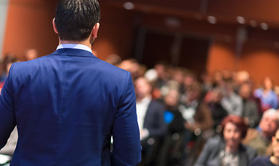 Image showing Public speaker giving talk at Business Event.