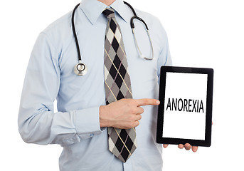 Image showing Doctor holding tablet - Anorexia