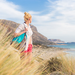 Image showing Free Happy Woman Enjoying Sun on Vacations.