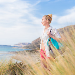 Image showing Free Happy Woman Enjoying Sun on Vacations.