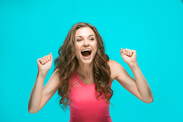 Image showing The young woman\'s portrait with happy emotions