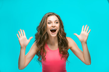 Image showing The young woman\'s portrait with happy emotions