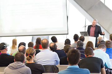 Image showing Male speeker having talk at public event.