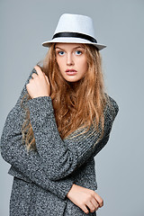 Image showing Fashionable beautiful woman in warm knitted cardigan
