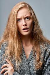 Image showing Closeup of angry woman on gray background