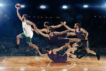 Image showing The collage from images of one basketball player with a ball against the fans