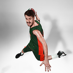 Image showing Full length portrait of a basketball player with ball