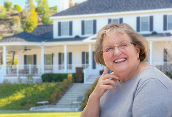 Image showing Senior Adult Woman in Front of House