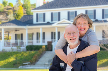 Image showing Happy Senior Couple in Front of House