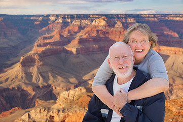 Image showing Happy Senior Couple Posing on Edge of The Grand Canyon