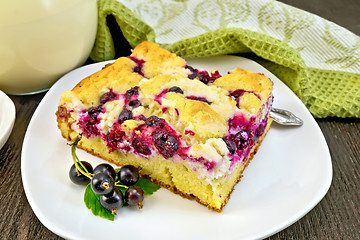 Image showing Pie with black currant in plate on board