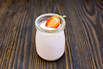 Image showing Yogurt with strawberries on board