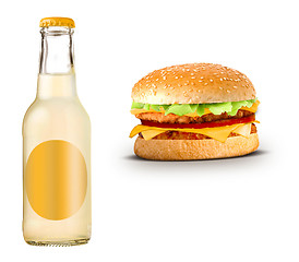 Image showing Bottle of yellow lemonade with cheeseburger