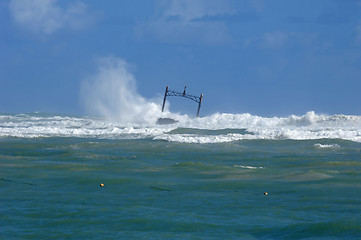 Image showing Sunken ship wreck and stormy sea