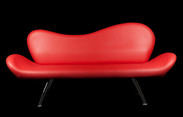 Image showing Red sofa on black background