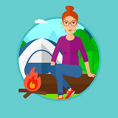 Image showing Woman sitting on log in the camping.