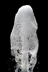 Image showing water fountain isolated on the black background