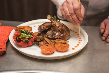 Image showing grilled duck legs