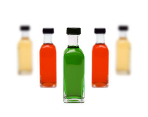 Image showing Line of glass bottles