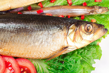 Image showing fish on plate with red pepper