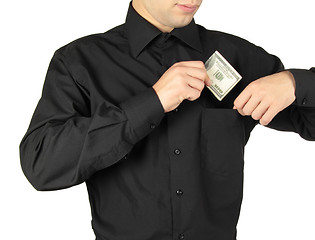 Image showing Businessman putting money in shirts\' pocket