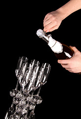 Image showing man hands opening champagne bottle