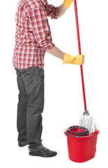Image showing man puts the mop in a bucket