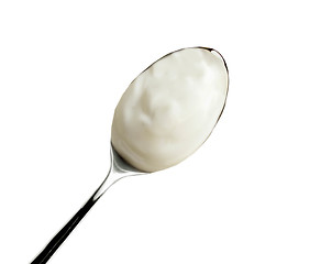 Image showing Spoon of yogurt isolated on white