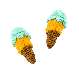 Image showing two different flavor ice creams with cone on white