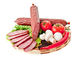 Image showing sliced sausage with vegetables and red papper