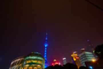 Image showing Shanghai skyline at night out of focus. 