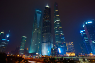 Image showing Shanghai skyline at night out of focus.