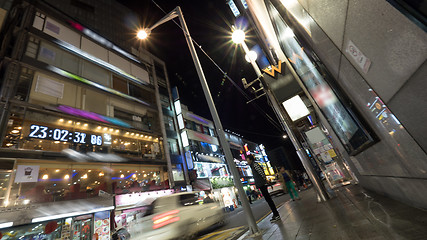 Image showing Night street with illuminated banners on buildings. Seoul, South Korea