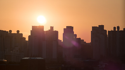 Image showing City buildings at warm light of morning sun. Seoul, South Korea