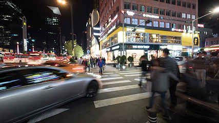 Image showing Pedestrians on zebra crossing in night Seoul, South Korea