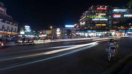 Image showing Night city street with transport in motion. Hanoi, Vietnam