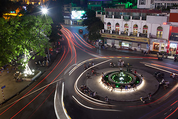 Image showing Night traffic on the square with motion trails. Hanoi, Vietnam